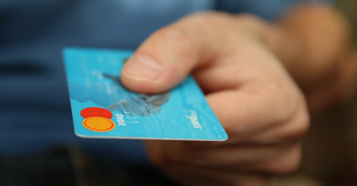 Person Holding Debit Card