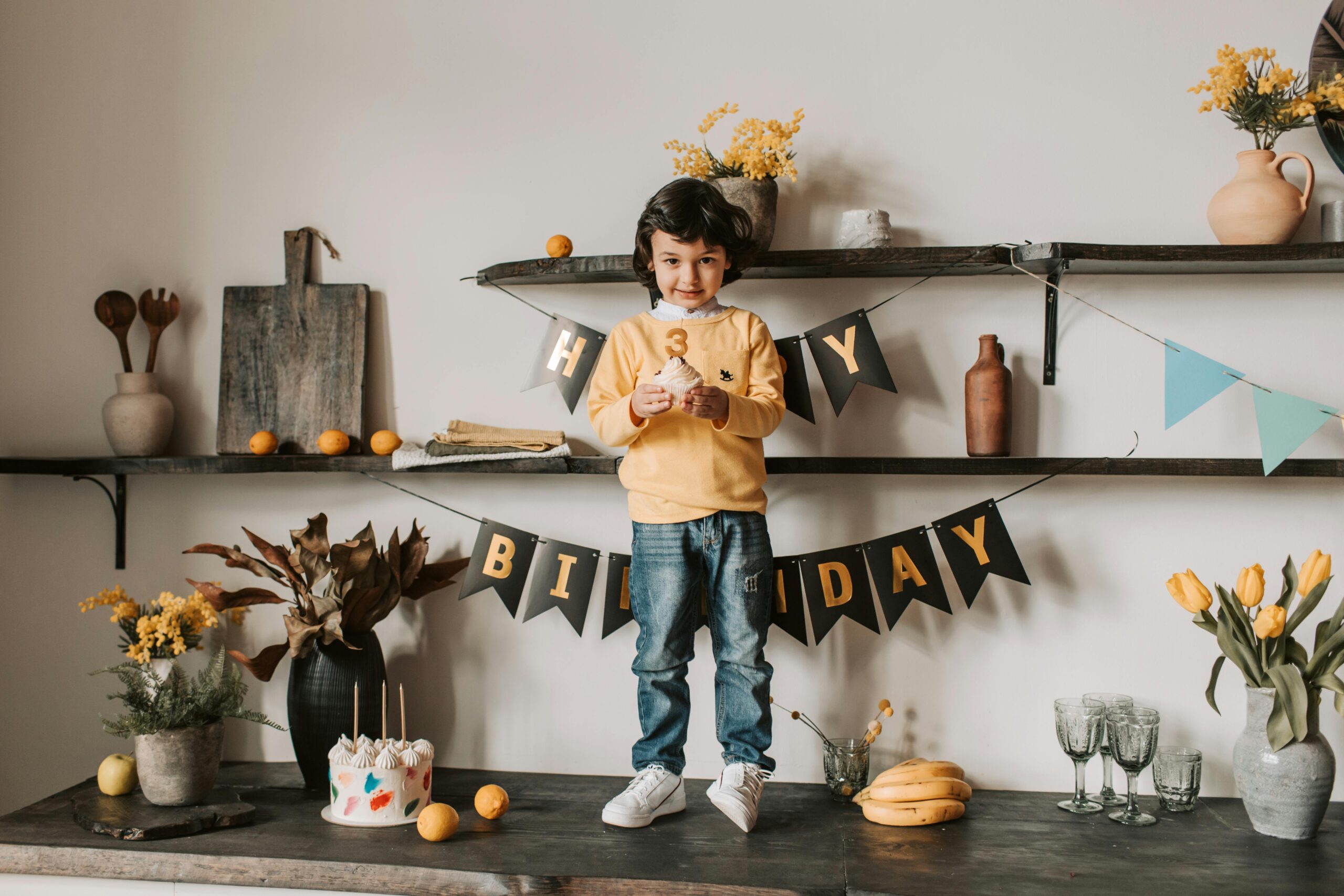 Little Boy Standing on Wooden Table